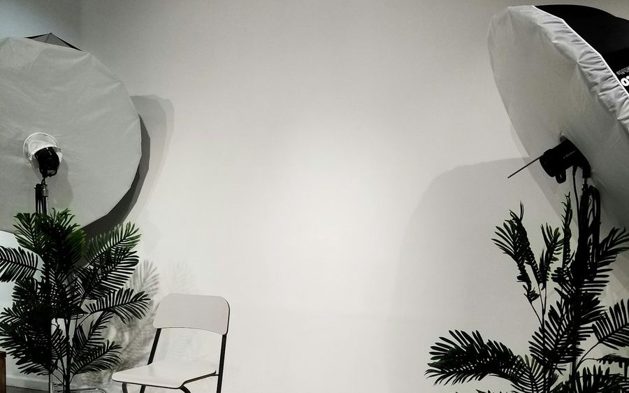 Example of a white studio wall with two large softbox lights